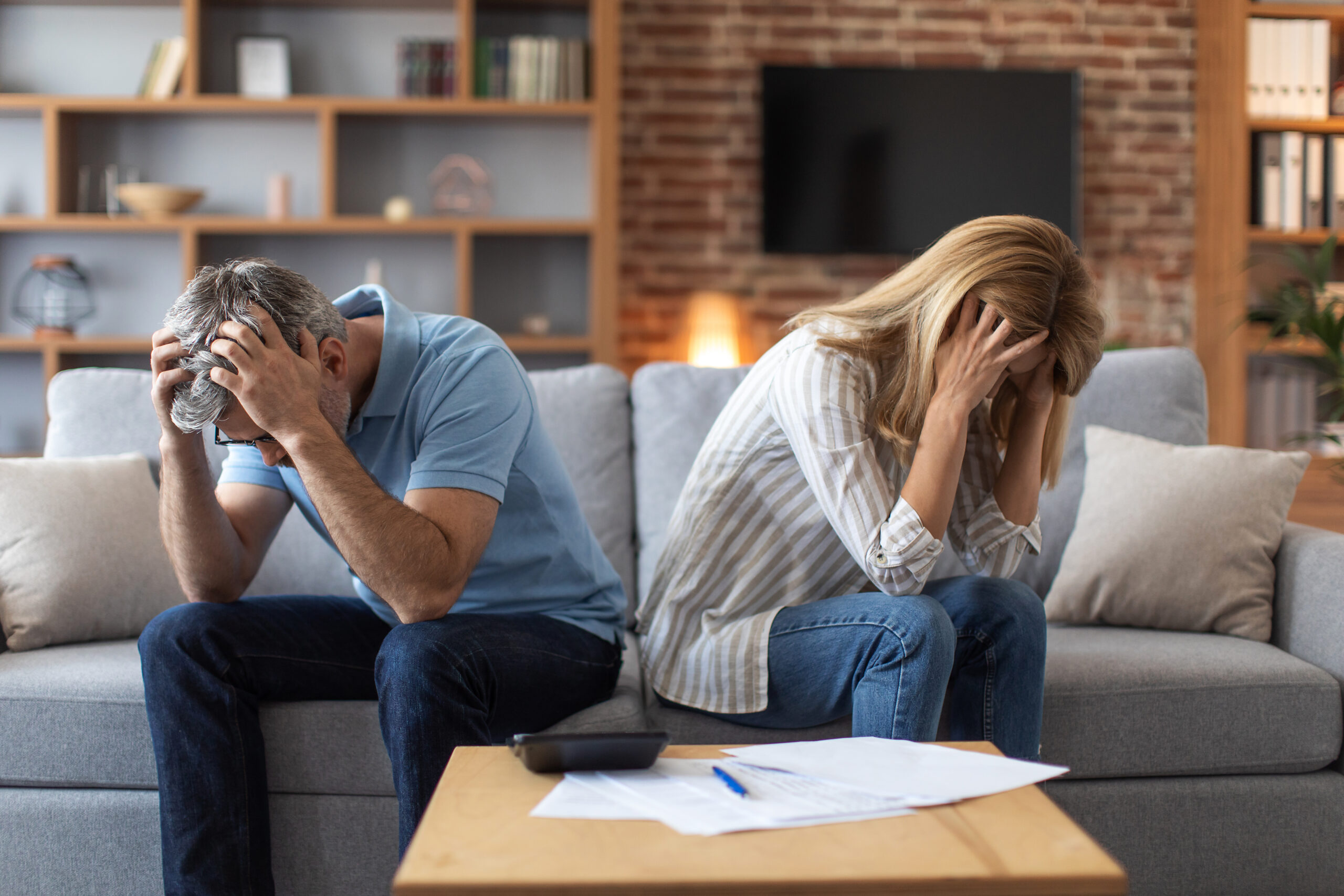 Unhappy couple considering divorce paperwork